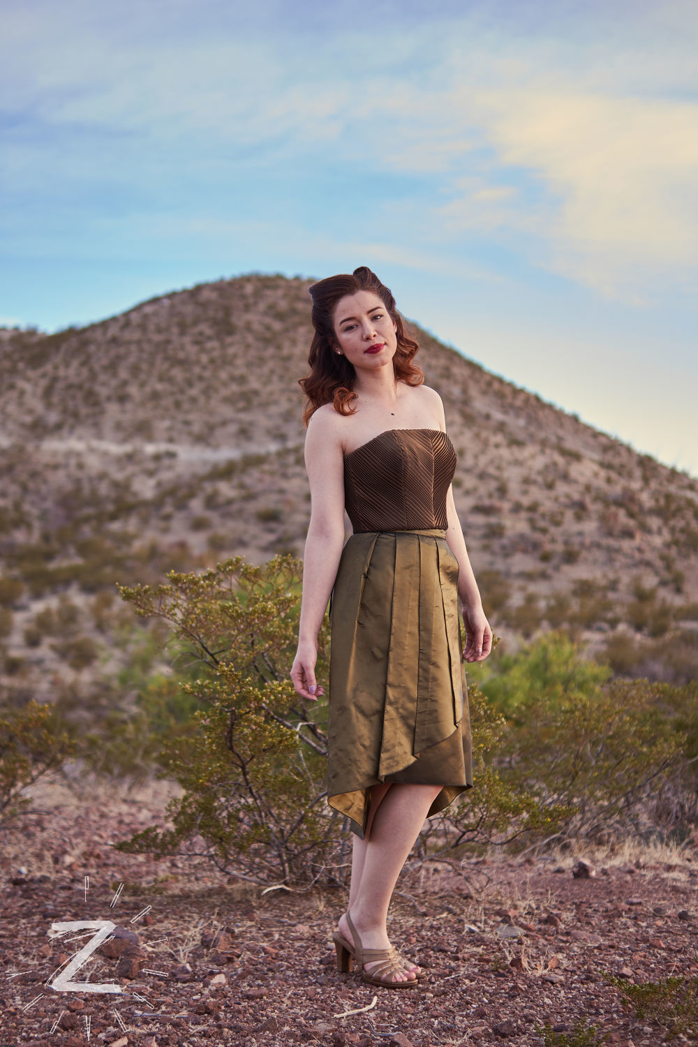 Album cover photo for the green dress inspired by Tom Lea's 'Rio Grande' painting